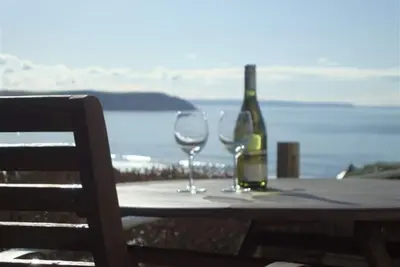 Image de Maison avec vue sur la plage et sur l'île de Lundy