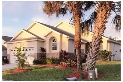 Image de Abordable 4 chambres / 3 salles de bain, piscine et spa, une connexion gaz Grill & WiFi-3 miles de Disney