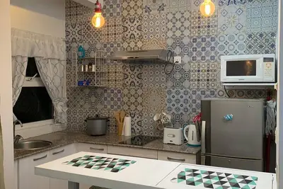 Image de Charmant studio situé au centre, à 30 mètres de la plage avec Wifi gratuit