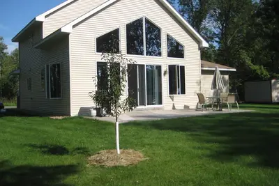 Image de Sunset Bay Getaway - Belle maison sur le lac des Mille Lacs, Plage De Sable!