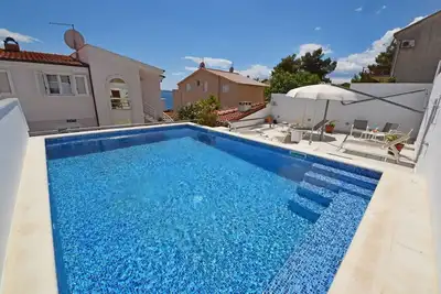 Image de Joli appartement avec climatisation, piscine, Wifi, Tv, terrasse, animaux admis et parking