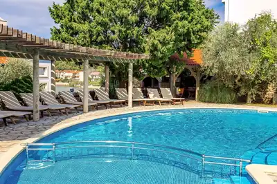 Image de Agréable appartement pour 4 personnes avec climatisation, Wifi, piscine, Tv et patio