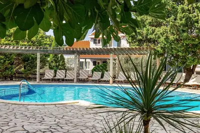 Image de Agréable appartement pour 6 personnes avec piscine, climatisation, Wifi, Tv et patio
