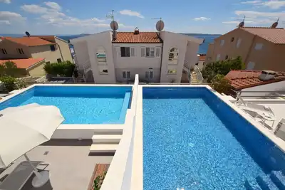 Image de Joli appartement avec piscine, Wifi, climatisation, Tv, terrasse, animaux admis et parking