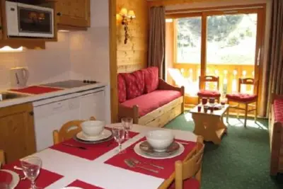 Image de - 35 M2, Situé aux pieds des pistes, vue montagne, parking privé couvert.