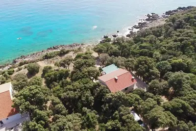 Image de Appartement de deux chambres avec la terrasse et la vue sur le mer Baie Mulobedanj, Pag (A-16285-b)