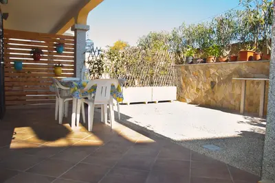 Image de Maison de vacances à Sa Petra Ruja avec de grands espaces extérieurs à deux pas de la mer