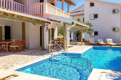 Image de Bel appartement pour 4 personnes avec climatisation, Wifi, piscine, Tv, terrasse et parking