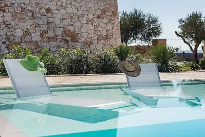 Image de Villa Oriana: Une villa de charme sur un étage située dans une position tranquille.