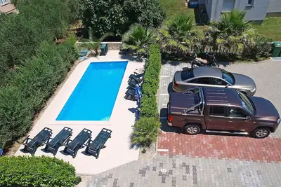 Image de Bel appartement pour 4 personnes avec climatisation, piscine, Wifi, Tv et terrasse