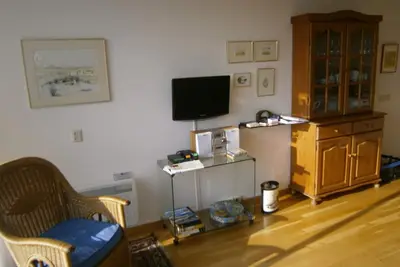 Appartement au bord de mer, parquet sur balcon orientée sud et piscine couverte