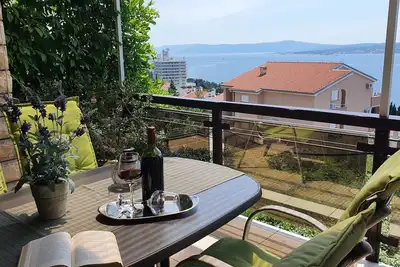 Image de Appartement confortable avec vue sur la mer, proche de la plage, familial, WiFi gratuit