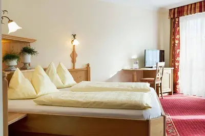 Image de Suite avec douche, Wc Edelweiss et Großglockner - Untermüllnergut, hôtel de campagne