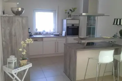 Image de Vacances avec chien, à environ 350m de la plage, cheminée, WiFi, clôturé
