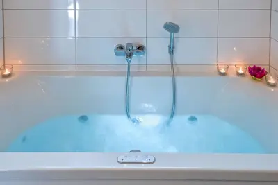 Image de Maison de vacances exclusive Dieboldsberg: sauna, bain à remous, cheminée, galerie de jeux et aire de jeux