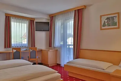 Image de Chambre triple avec douche, toilette - trombone, pension