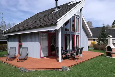 Image de Maison de vacances sur le Scharmützelsee à Wendisch Rietz avec sauna, barbecue, WiFi, cheminée
