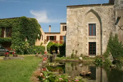 Image de 🏡Gîte insolite - moulin à eau avec piscine et grand parc verdoyant🌴🏊‍