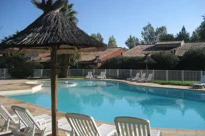 Image de MiniVilla Liflosa mitoyenne climatisée avec piscine plages accessibles à pied