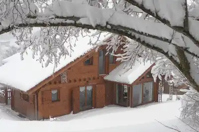 Image de Chalet idéal familles proche 2 lacs. Classé 4 * Sauna Jacuzzi garage 5 ch 3 sdb