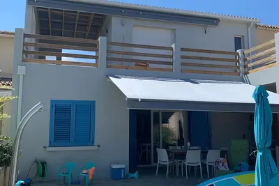 Image de Maison avec accès direct à la plage