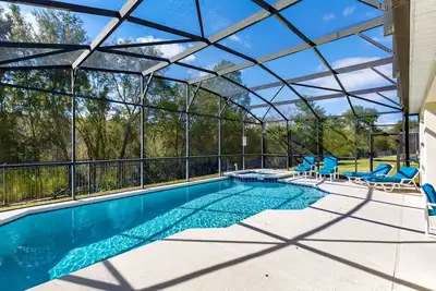 Image de 4br / 3ba Windsor Palms villa avec piscine plein sud, privative à Disneyworld