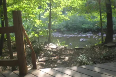 Image de Log Cabin on Sleepy Creek - Profitez de l'isolement et des bruits de l'eau