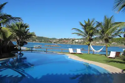 Image de Magnifique maison dans le sable de la plage de Horseshoe, avec 5 suites et belle piscine.