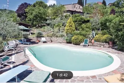 Image de Portion de ferme dans le Chianti avec piscine panoramique