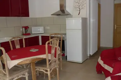 Image de Gîte le Romarin dans une ferme rénovée.