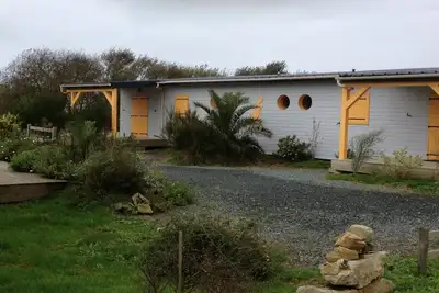 Image de Location chalets bois Ă 500 mĂŞtres des plages et des vagues