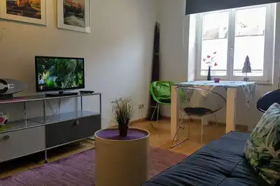 Image de Ville situé dans le centre, WiFi, espace de stationnement, bien desservi par les transports