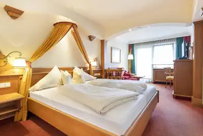 Image de Chambre double confort - Romantik Hotel Wastlwirt ****