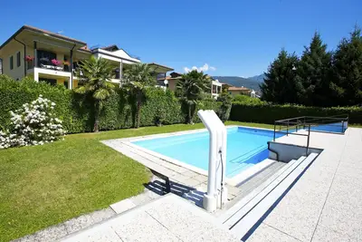 Image de Appartement de 3 pièces dans une résidence avec piscine directement sur la plage de sable