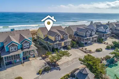 Image de 4 chambres Ă droite sur la plage