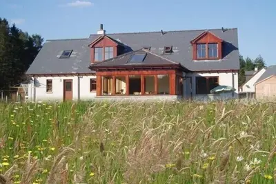 Image de Maison avec des vues spectaculaires sur la forêt d'Abernethy et les montagnes de Cairngorm