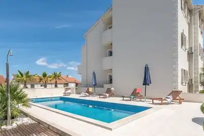 Image de Confortable appartement pour 6 personnes avec Wifi, climatisation, piscine, Tv, terrasse et parking