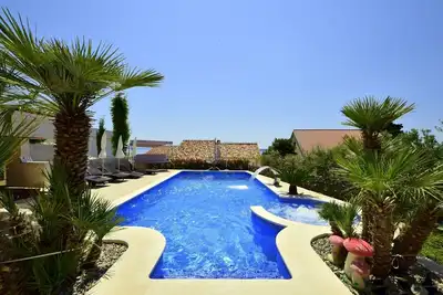 Image de Bel appartement pour 3 personnes avec climatisation, Wifi, piscine, Tv, terrasse et parking
