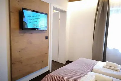 Image de Chambre familiale avec douche, Wc - Hotel Aschauer Hof