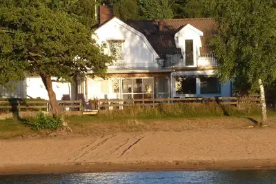 Image de Luxueuse maison de plage avec 3 chambres à coucher, directement sur la plage de sable fin, soleil couchant, multibastu, pêche