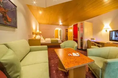 Image de Chambre Edelweiss avec Südbk. / Cabine infrarouge, 4-6 N ° - Alpenhof, hôtel de campagne