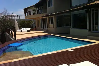 Image de Maison spacieuse et confortable à Ilhabela avec une vue imprenable w / la mer