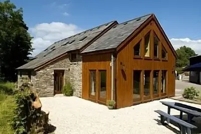 Image de Riverbank Barn Conversion (daté 1770) Offres Hébergement de luxe de 15 personnes