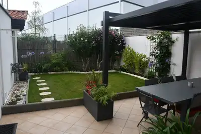 Image de Maison 7 pers, 3 ch, 2 SdB, quartier calme, proche plage et golf.