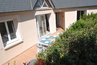 Image de Maison de vacances entre plage et dunes dans site naturel préservé.