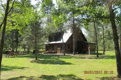 Image de Boardman River (Traverse City) Log Cabin - Votre paradis pour la pĂŞche et la motoneige!