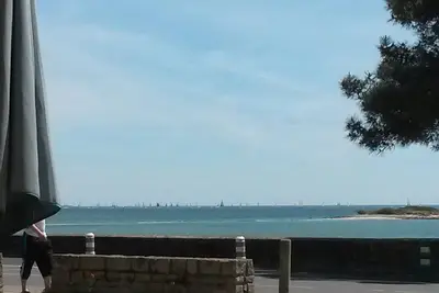 Image de Appartement Spacieux Face Aux Iles-wifi gratuite