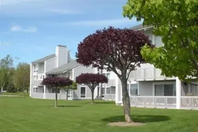 Image de Le lac de Charlevoix Condo Dans le Débarquement à Boyne City