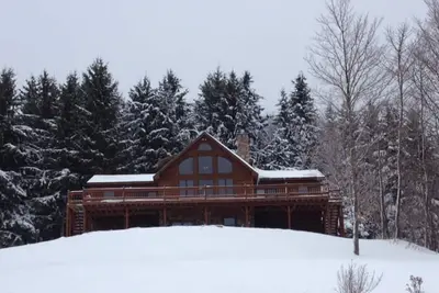 Image de Maison en rondins pour les familles à Greek Peak Mountain Resort