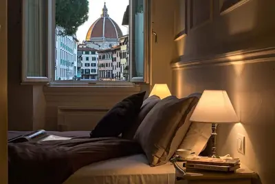 Image de Suite Deluxe avec vue magnifique! Lit et vue au coeur de Florence.
